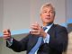 Jamie Dimon, head of JP Morgan, has criticised US tax policy for failing to growth jobs and wages.
